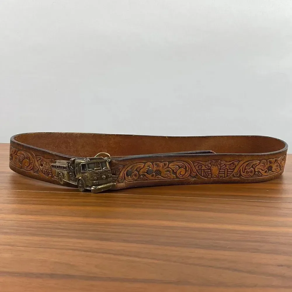 Vintage brown leather hand tooled Western belt.